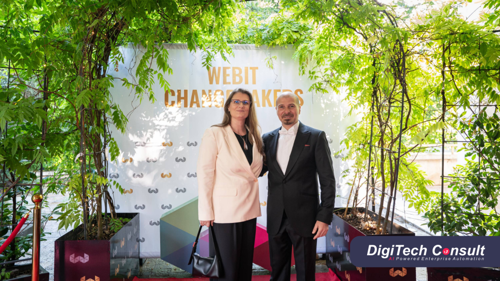 Milena Ribarova and another attendee standing in front of a Webit Changemakers backdrop in Sofia